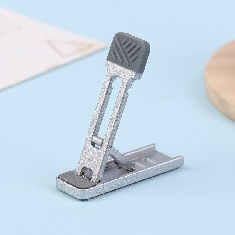 新しいミニ亜鉛合金製ノートパソコンスタンド、高さ調節可能、折 - Laptop Stand Foldable のレビューと価格